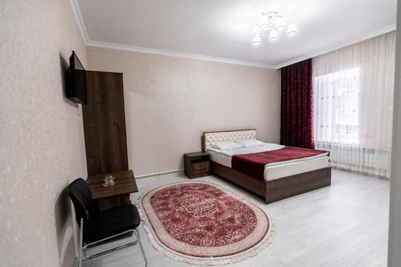 Mixx Hotel Karakol Bagian luar foto